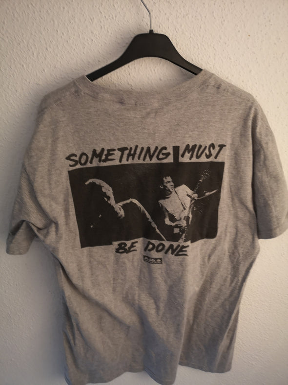 Something Must Be Done : Large